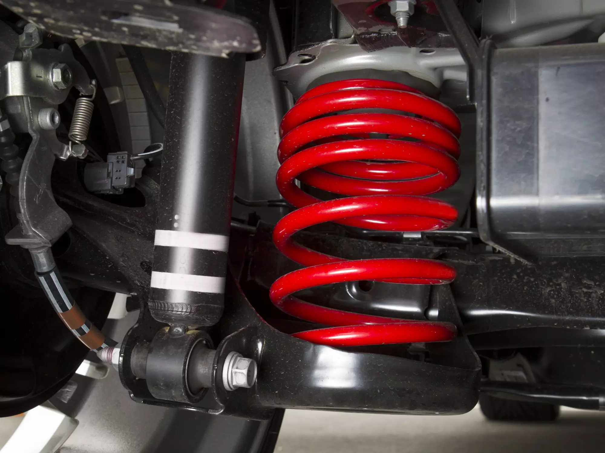 left-rear coil spring and shock absorber